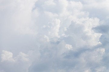 White fluffy clouds in the blue sky