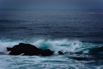 Waves and rocks in the Pacific Ocean, in Pacific Grove, Californ