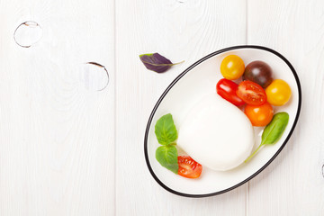 Mozzarella, tomatoes and basil