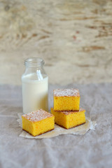 pieces of pumpkin cake and a bottle of milk 