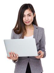 Businesswoman use of laptop computer