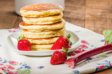 Stack of pancakes with strawberries