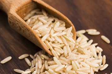 Spoon of brown rice close up