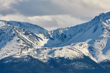 Fototapeta na wymiar Mountains covered with snow in Altai in spring