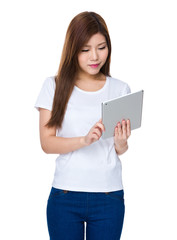 Young woman read on digital tablet