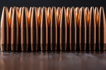 Macro shot of copper bullets that are in many row