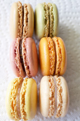 Different kinds of traditional colorful french macaroons