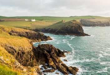Coastline in late evening sun at Port Quin
