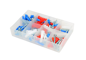 Screw and dowel in plastic box, isolated on the white background