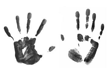 Black prints of human palms isolated on white
