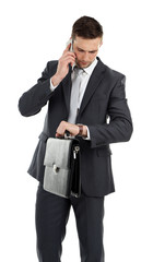 Fototapeta premium Man holding bag isolated on white