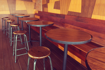 Coffee shop cafe Interior with wood table. (Vintage process)