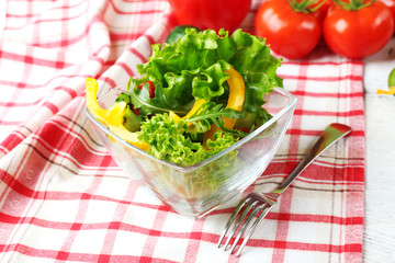fresh vegetable salad in bowl on table close up