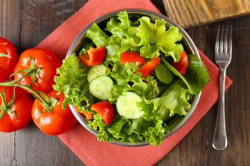 fresh vegetable salad in bowl on table close up