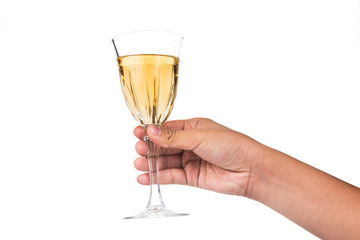 Hand holding white wine in crystal glass and ready to toast