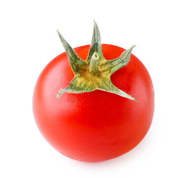 Single fresh cherry tomato isolated on white