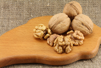 Walnuts on a wooden board (cutting board)