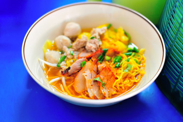 Red pork noodle in soft light