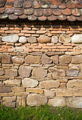 Rustic wall with layers of different comstruction materials