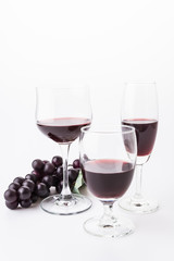 Red wine and grapes