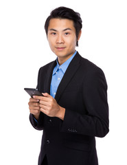 Asian businessman hold with cellphone