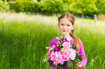 Little girl with flowers