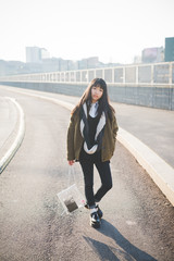 young beautiful asian hipster woman