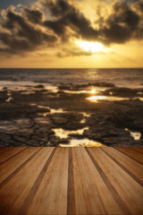 Fototapeta na wymiar Beautiful seascape at sunset with dramatic clouds landscape imag