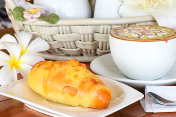 Sweet bun with coffee for serve