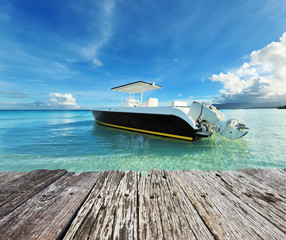 Fototapeta na wymiar Beautiful beach with motor boat