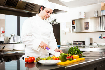 Chef cutting vegetables