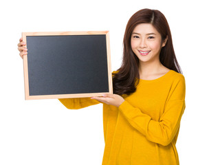 Young woman hand hold with the blackboard