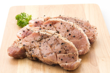 raw meat pork steak with black pepper