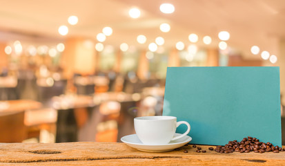 Coffee shop blur background with bokeh image .