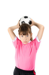 Little happy girl in pink holding soccer ball on white backgroun