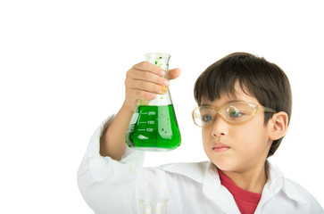 Little boy learning in chemecal in science in class