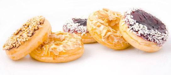 Various sugary donuts isolated on white background
