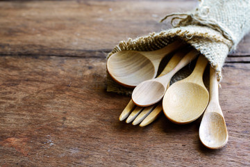 Set of wood spoon and fork on wooden table