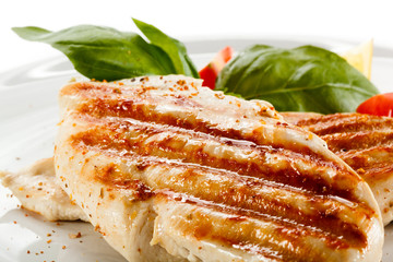 Grilled chicken fillets, rice and vegetables