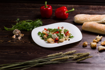 Vegetable salad with croutons.