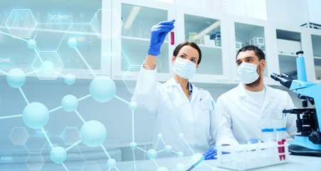 young scientists making test or research in lab
