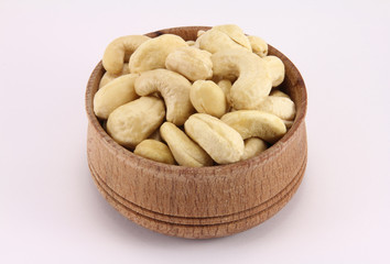 Cashews in a round wooden form