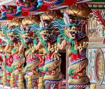 Four Chinese Dragons on Red Pillar