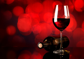 Plakat Red wine on red background
