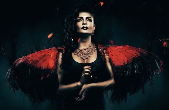 dark angel transvestite with red wings