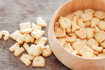 Alphabet biscuit in wooden tray