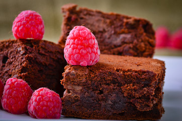 Chocolate brownies and raspberries