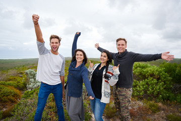 Feeling happy with friends outdoors in nature