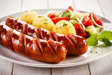 Grilled sausages and vegetables 