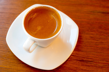 hot cappuccino coffee on white cup